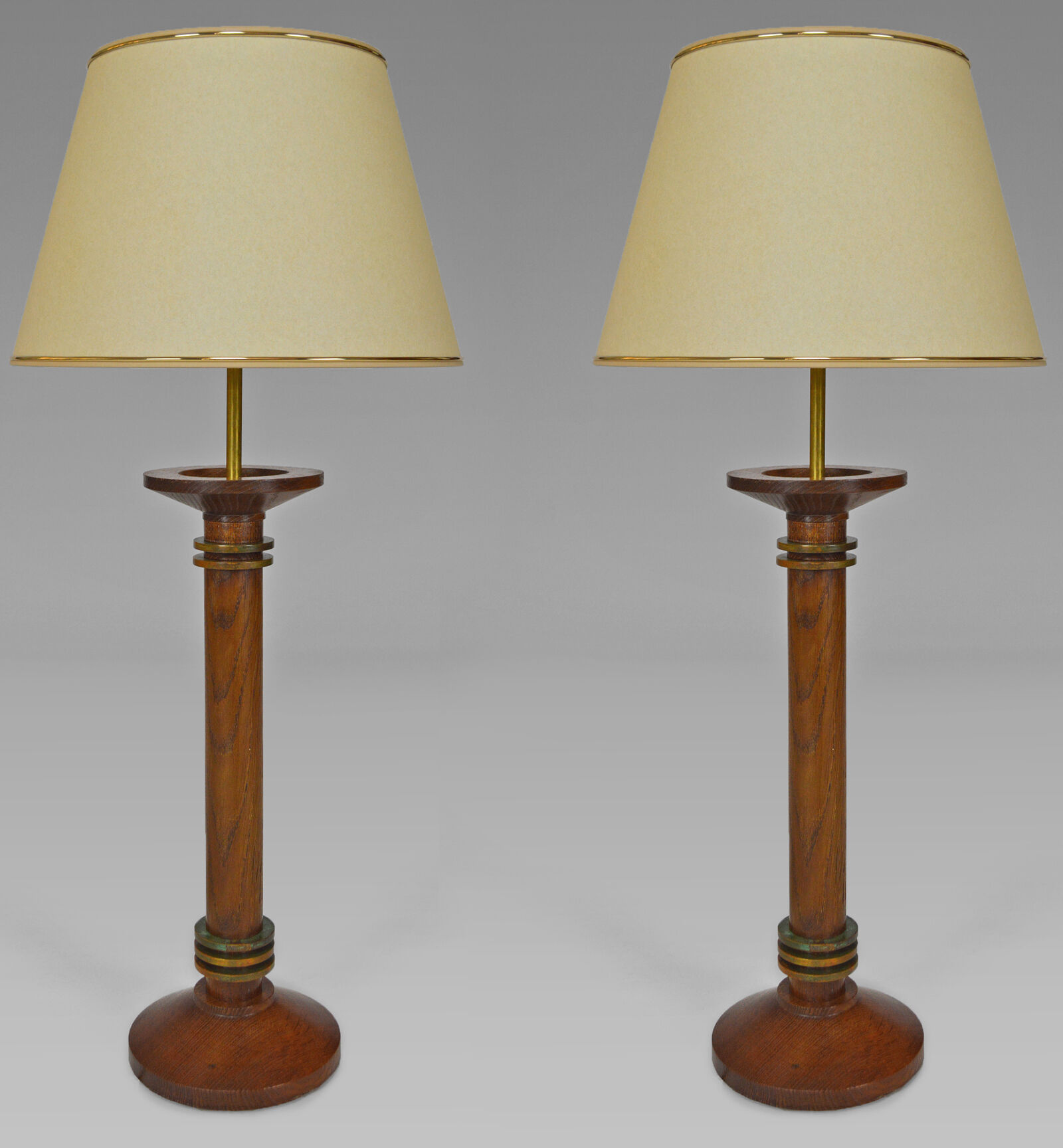 Pair of art deco lamps in wood and patinated bronze around 1930