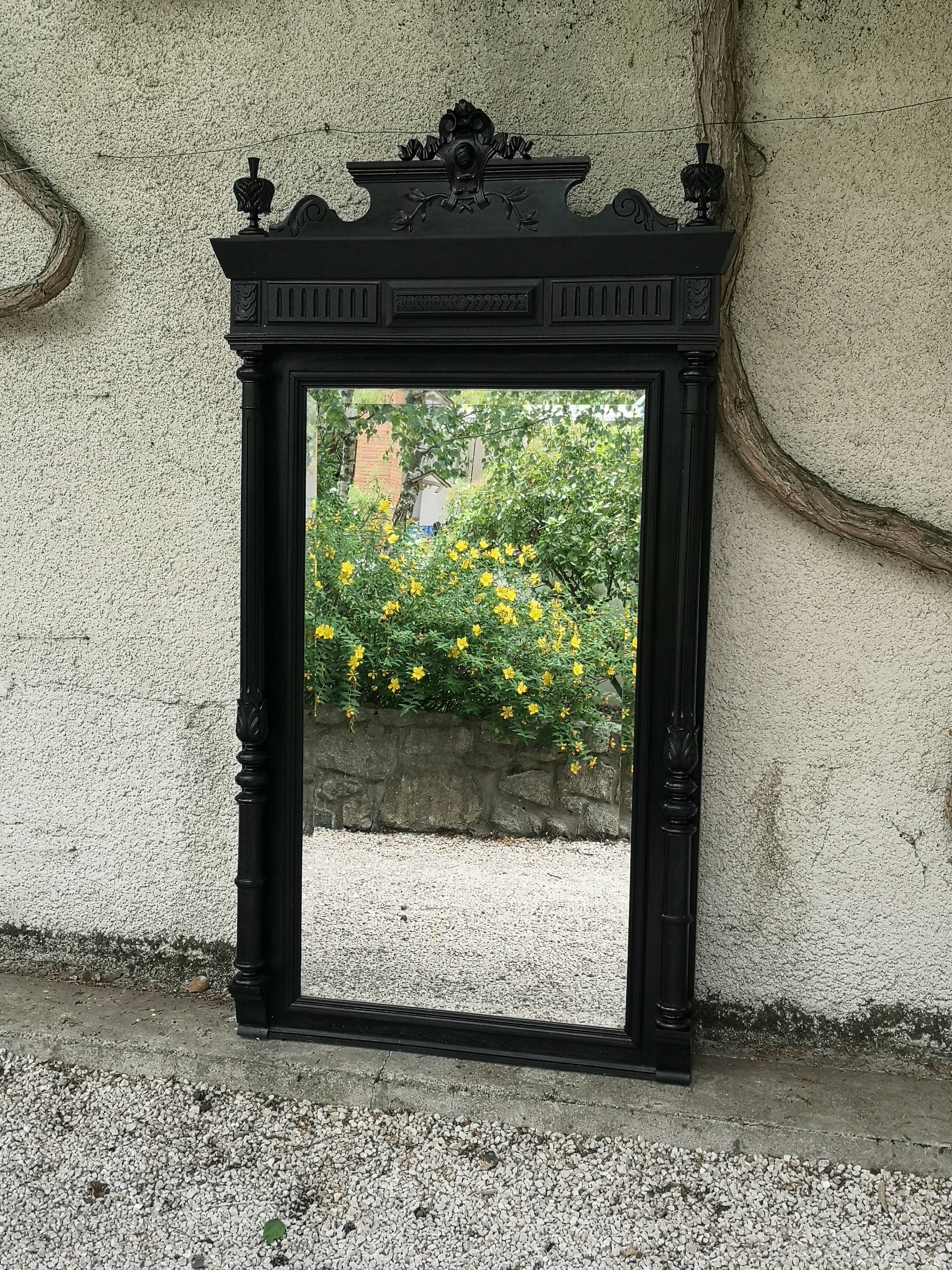 Trumeau mirror in blackened wood 19th