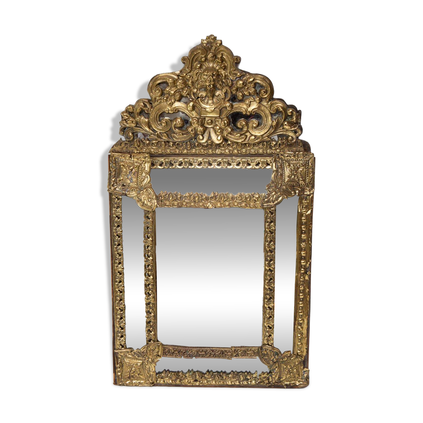 Antique French mirror in repoussé brass with a 19th-century pediment (60*34 cm)
