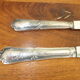 23 silver metal knives