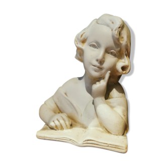 Bust child reading