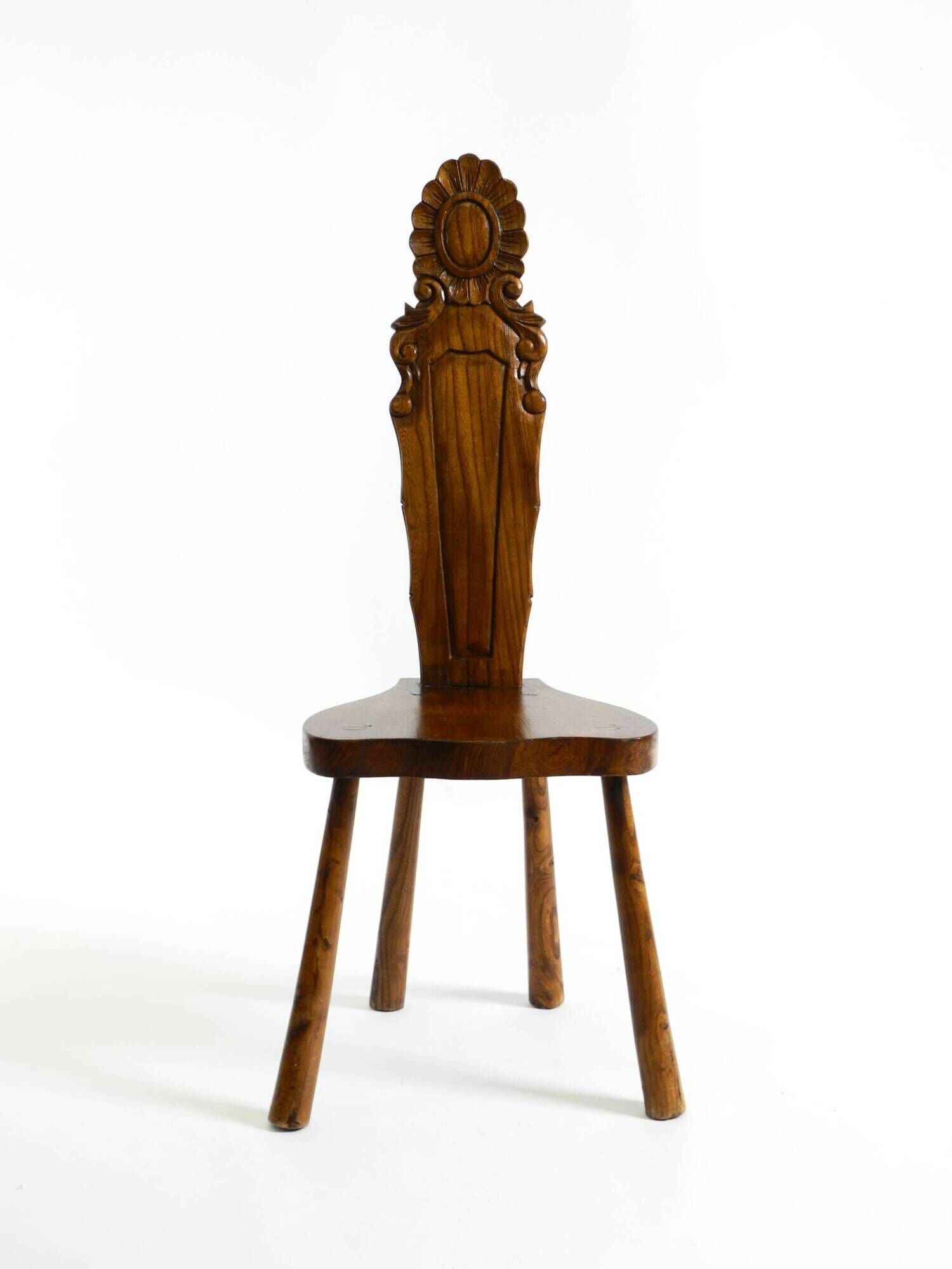 Solid wood chair with an ornate, hand-carved backrest – Made in Spain