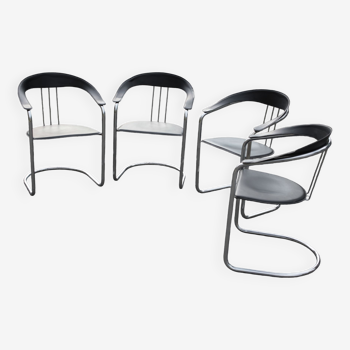 Quatre chaises avec accoudoirs style Arrben