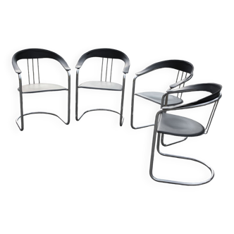 Four chairs with Arrben style armrests