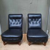Pair of upholstered low chairs without arms