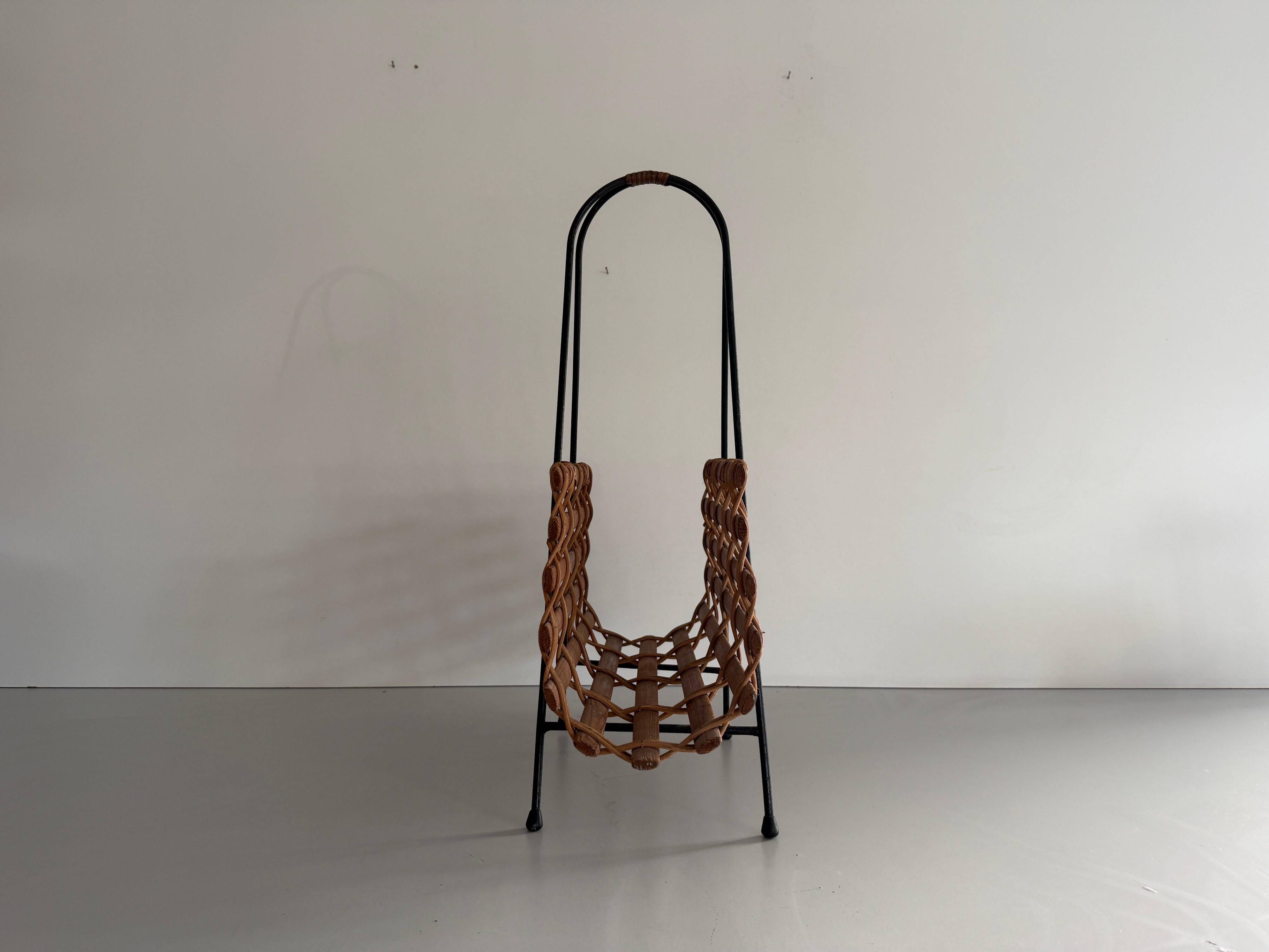 Mid-century black metal and wicker magazine rack, 1960, Germany