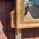 Miroir ancien en bois sculpté et doré
