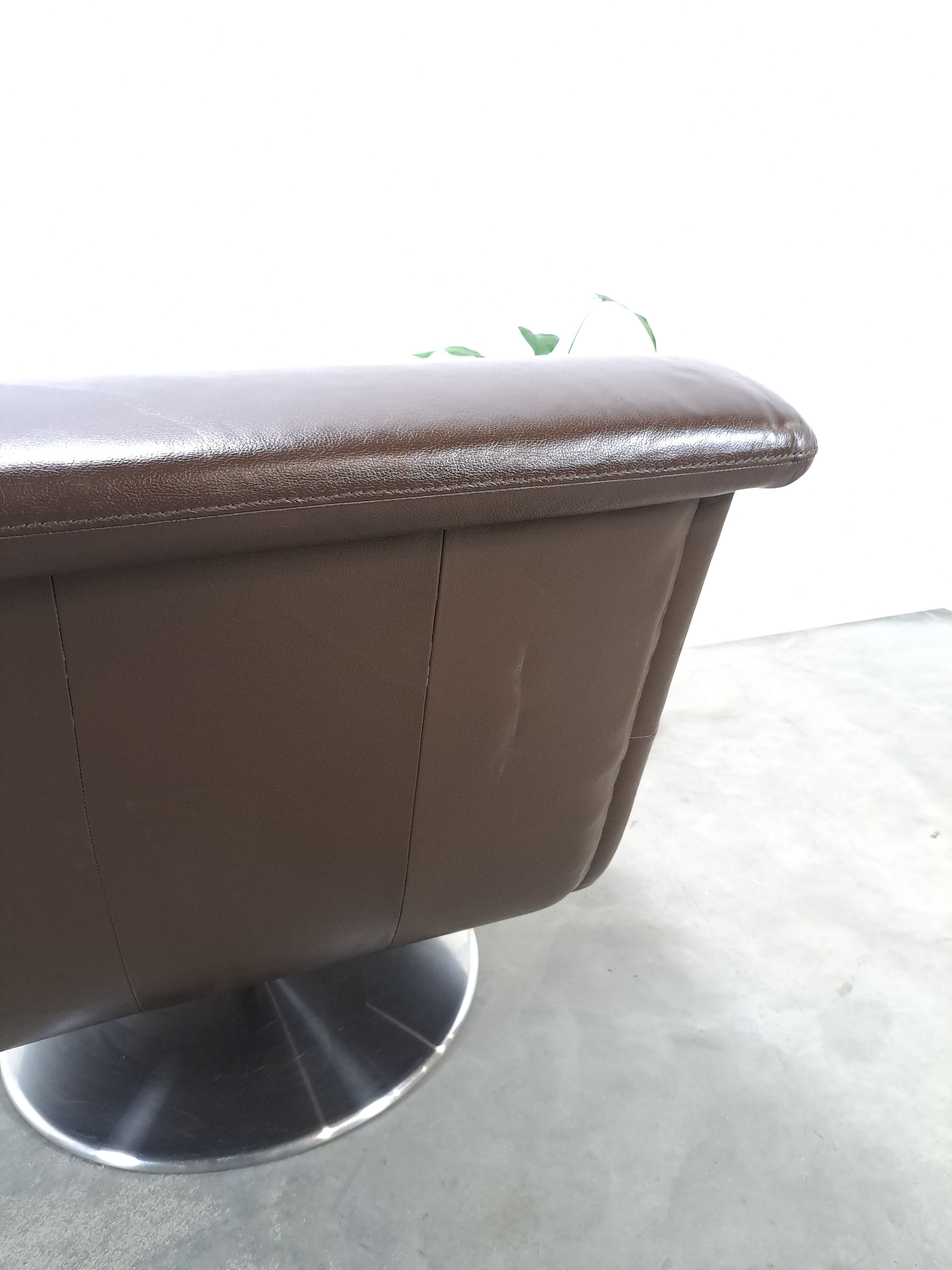 Brown leather swivel chair