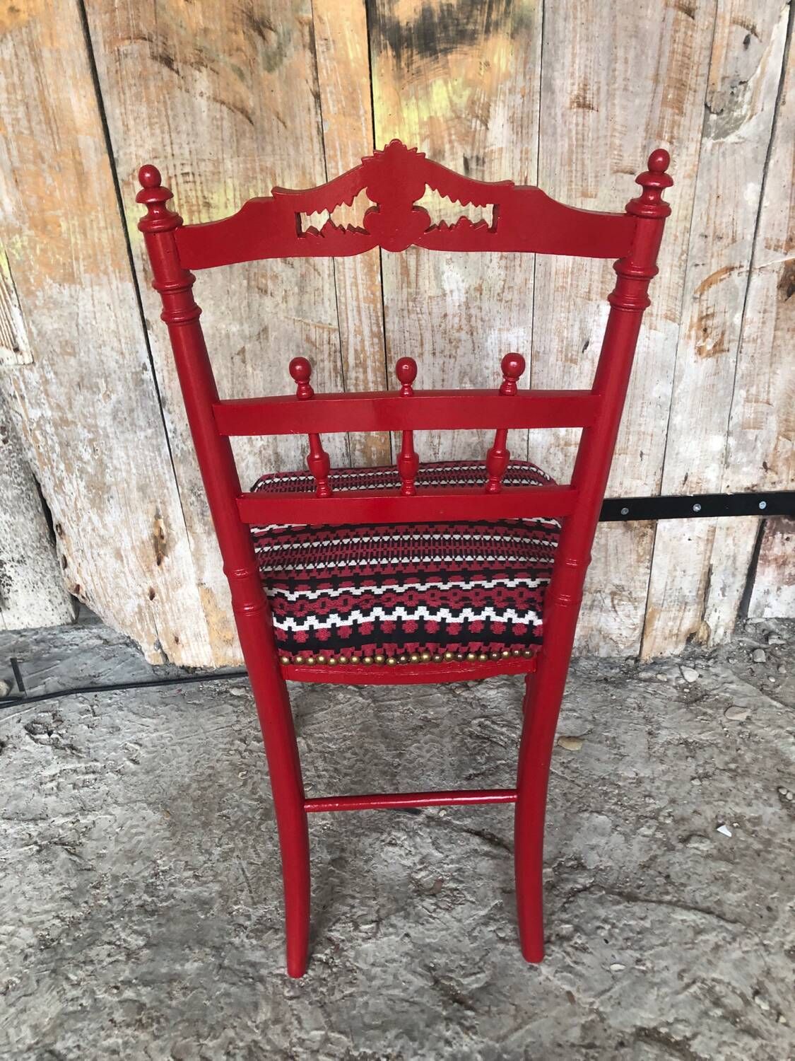 Red carved wood bedroom chair & vintage striped fabric seat