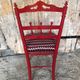 Red carved wood bedroom chair & vintage striped fabric seat