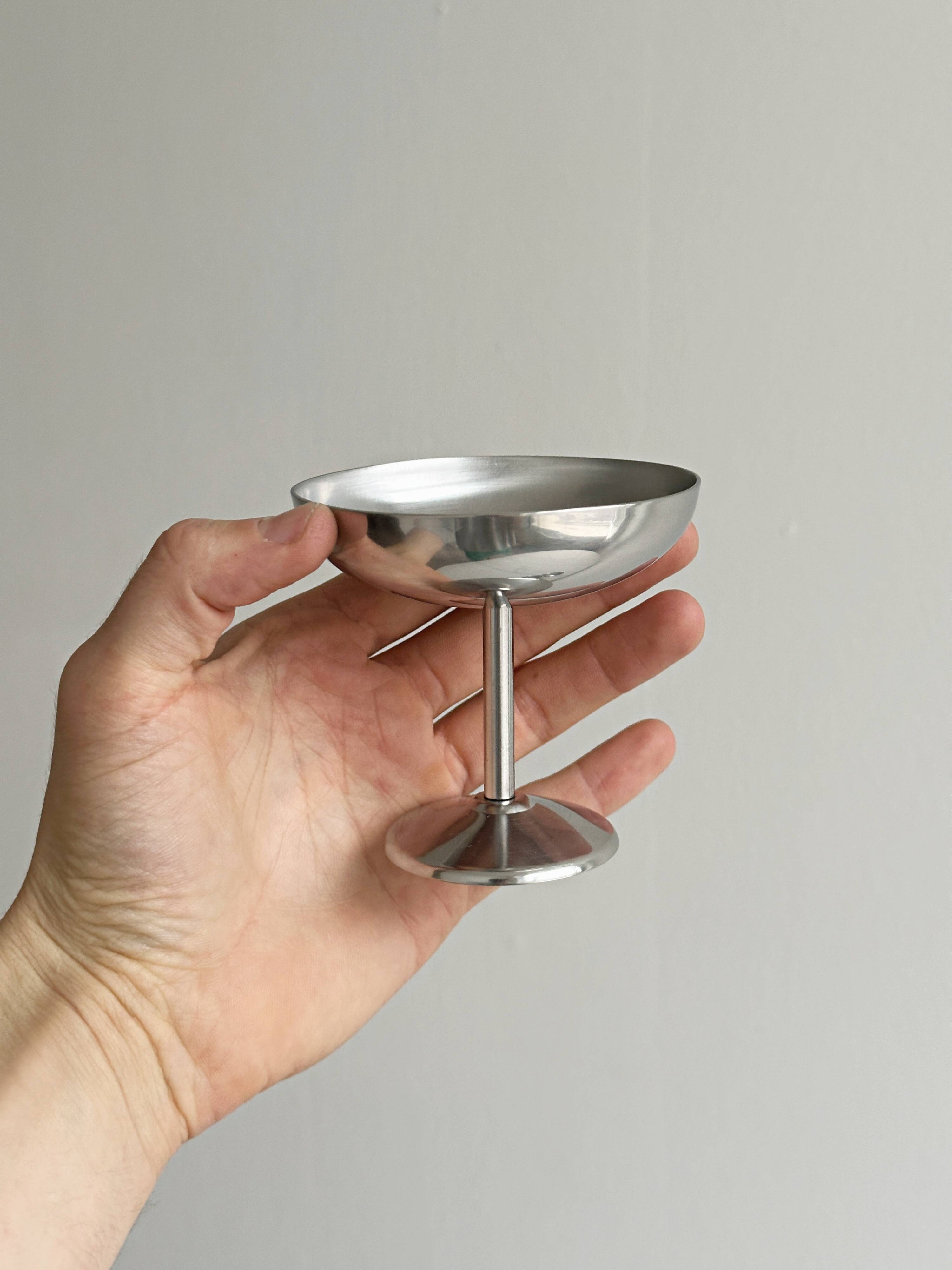 6 metal bowls in the style of Guy Degrenne