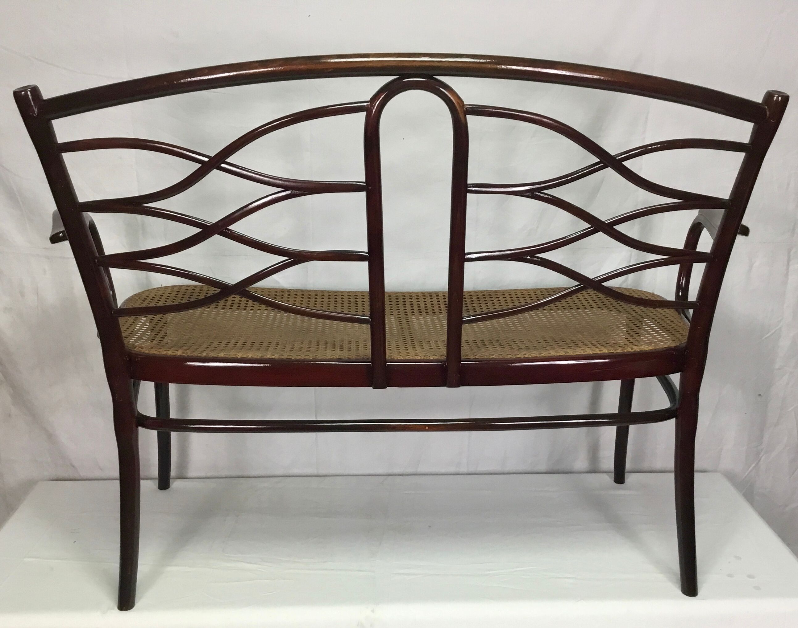 Turned wooden bench with caning by Thonet, Austria