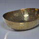 Empty hammered brass pocket