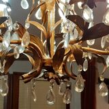 Very pretty chandelier with tassels and leaves in gold sheet metal.