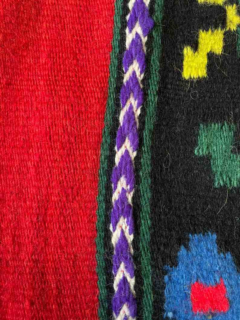 Romanian wool rug, red background with delicate colourful flowers
