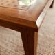 Large handcrafted coffee table in exotic wood + nesting tables.
