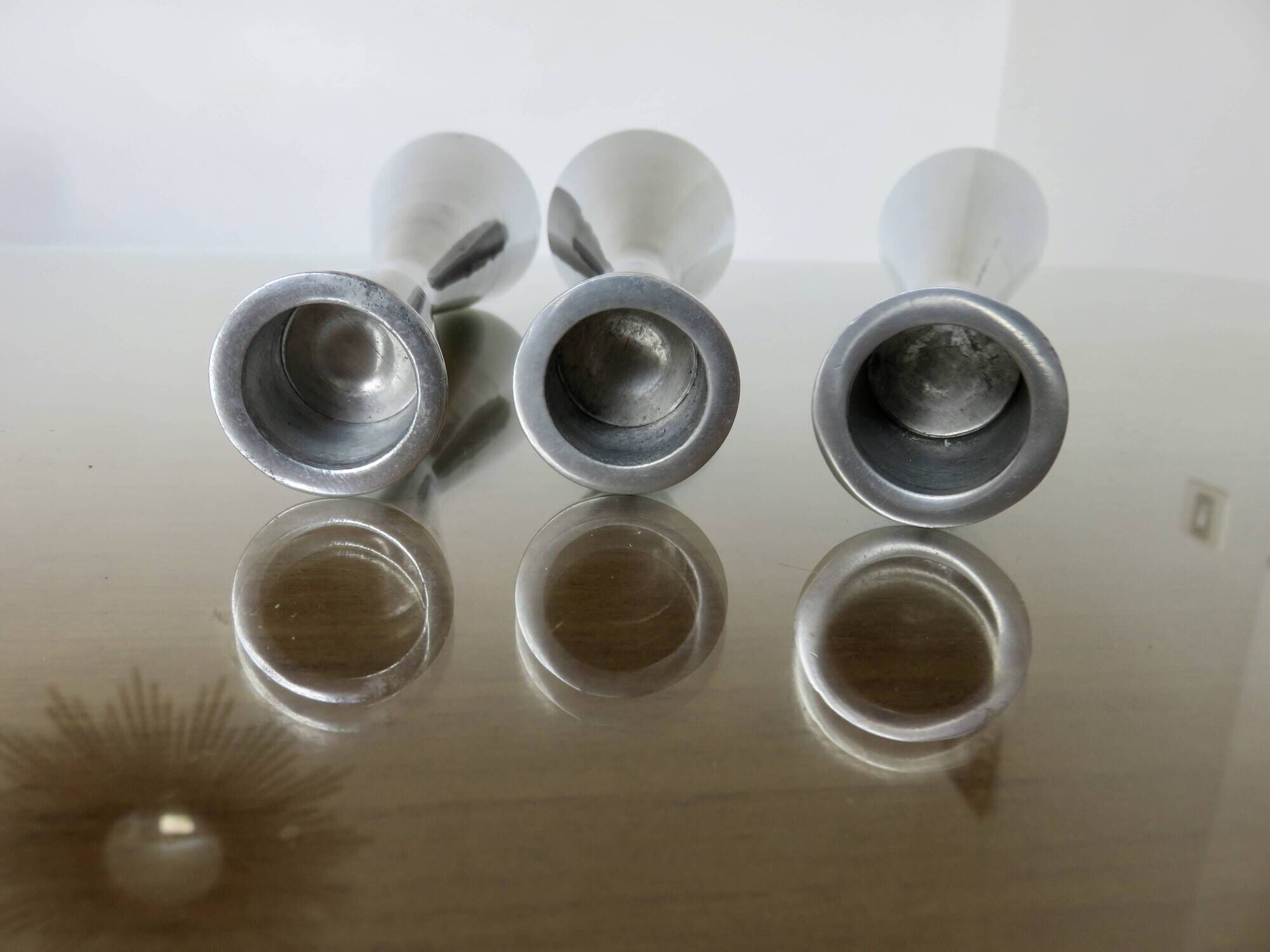 Series of 3 Scandinavian "diabolo" candlesticks in aluminum 1970