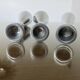 Series of 3 Scandinavian "diabolo" candlesticks in aluminum 1970