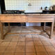 Renovated raw wood farmhouse table