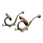 Pair of important Art Nouveau coat hooks in bronze and chestnut circa 1930.