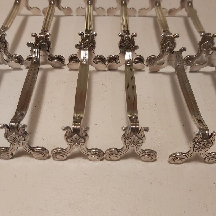 Ensemble de 12 porte-coûteaux Christofle métal argenté