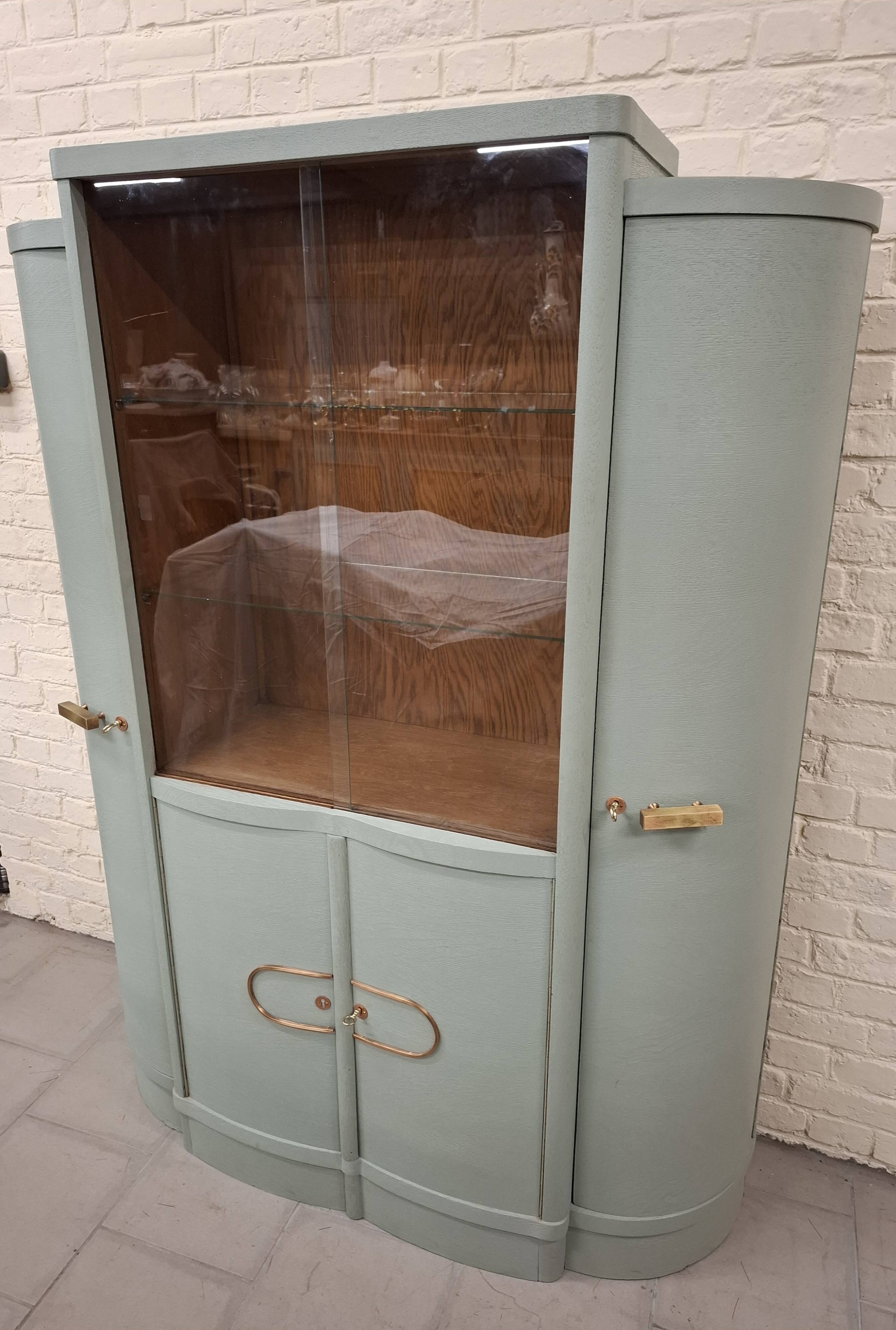 Vintage glass-fronted cabinet, bookshelf.