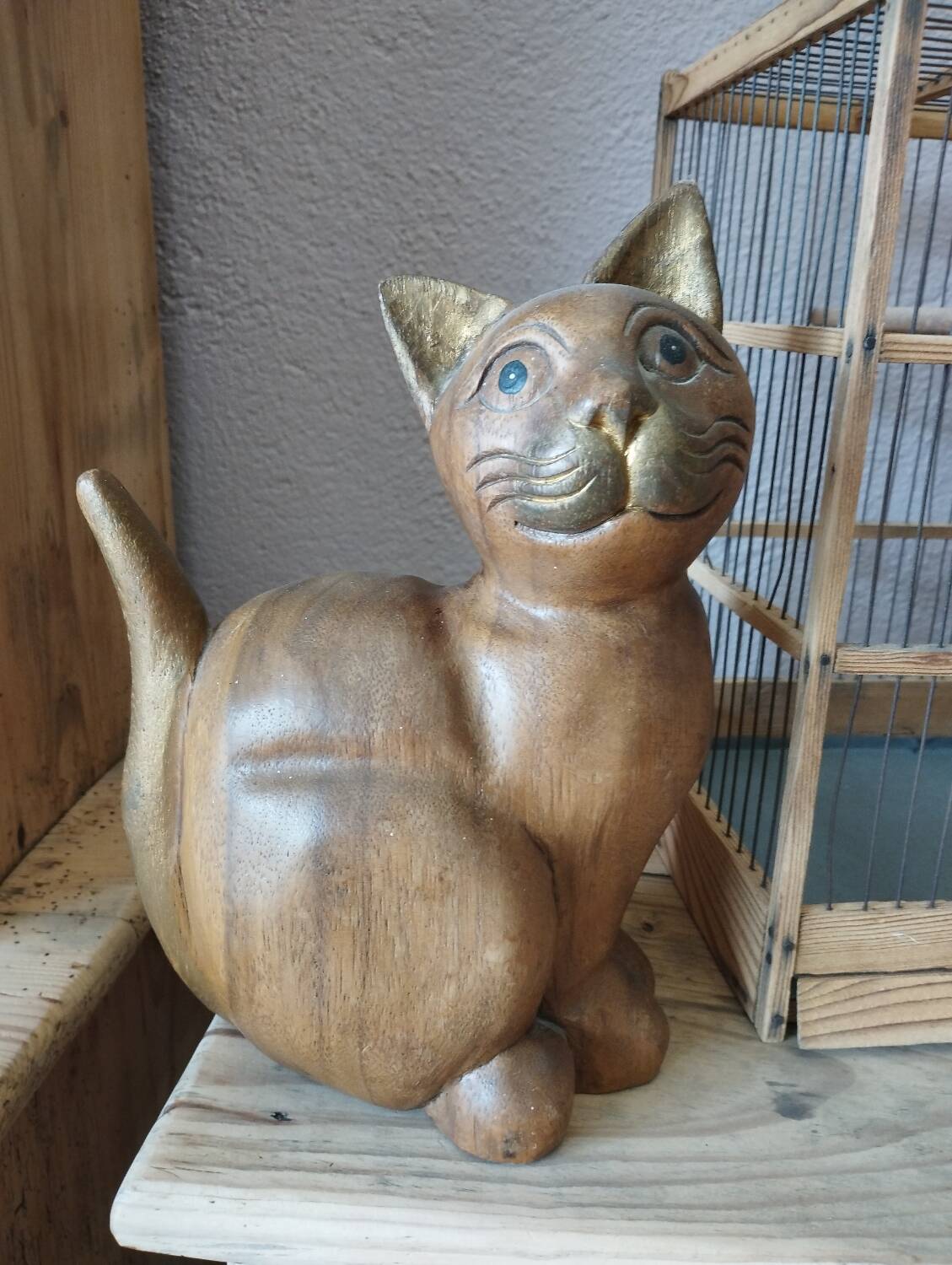 Wooden cat sculpture