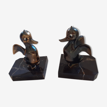 Marble book ends and regulates: ducks