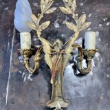 Pair of double sconces in gilded bronze