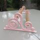 Old towel rack art deco in pink enamelled cast iron
