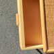 Pair of rattan bedsides, a drawer