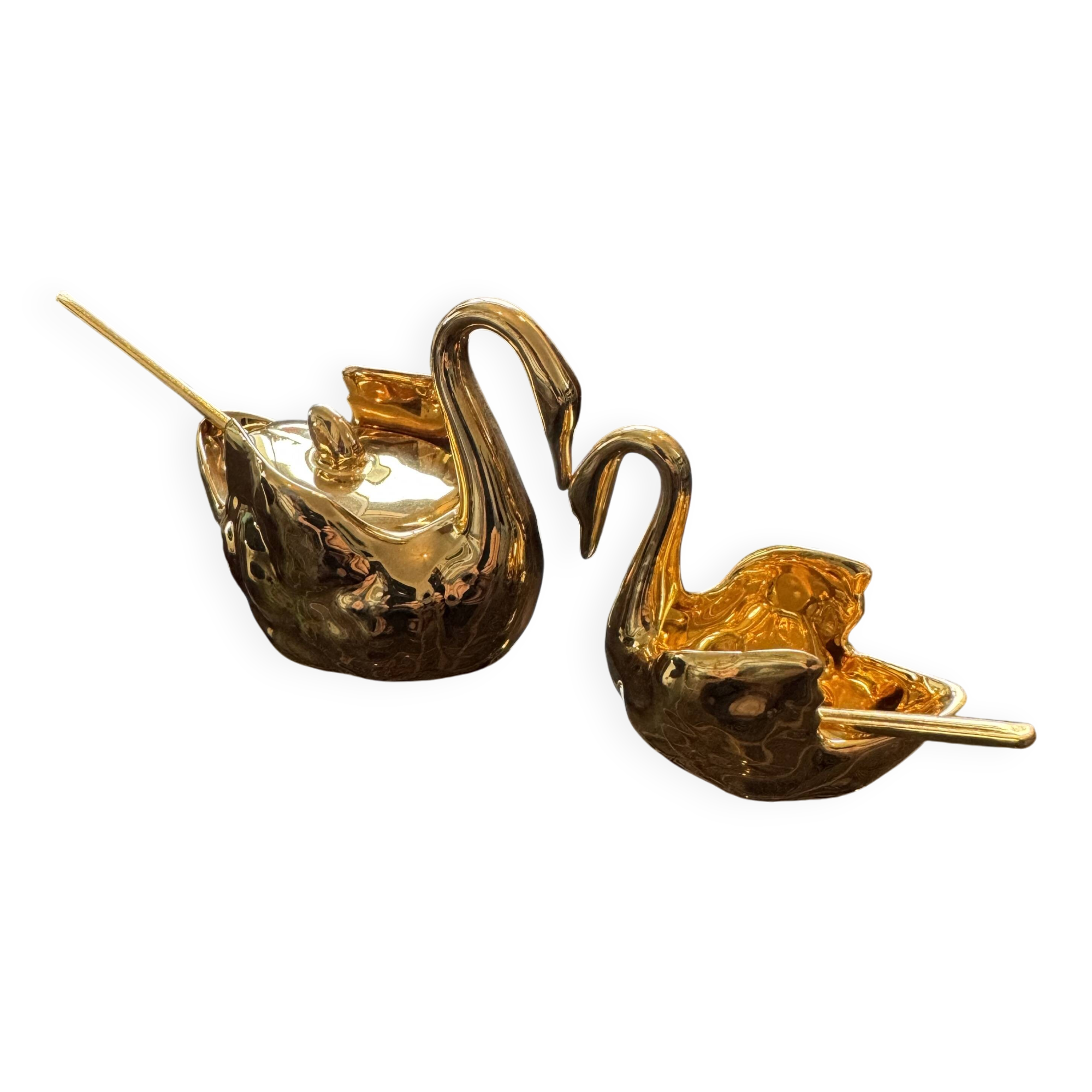 Pair of golden salt cellars in Limoges porcelain shaped like swans