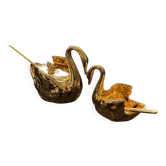 Pair of golden salt cellars in Limoges porcelain shaped like swans