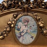 Miroir de style Louis XVI en bois et stuc doré XX siècle