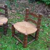 1 pair of low straw armchairs