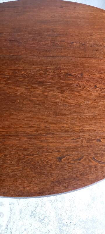 Vintage round extendable wooden table.