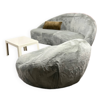 Designer crescent sofa with its armchair from the 1970s