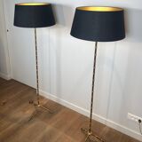 Pair of parquet floor lamps in faux-bamboo style in bronze and brass by Jacques Adnet.