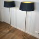 Pair of parquet floor lamps in faux-bamboo style in bronze and brass by Jacques Adnet.