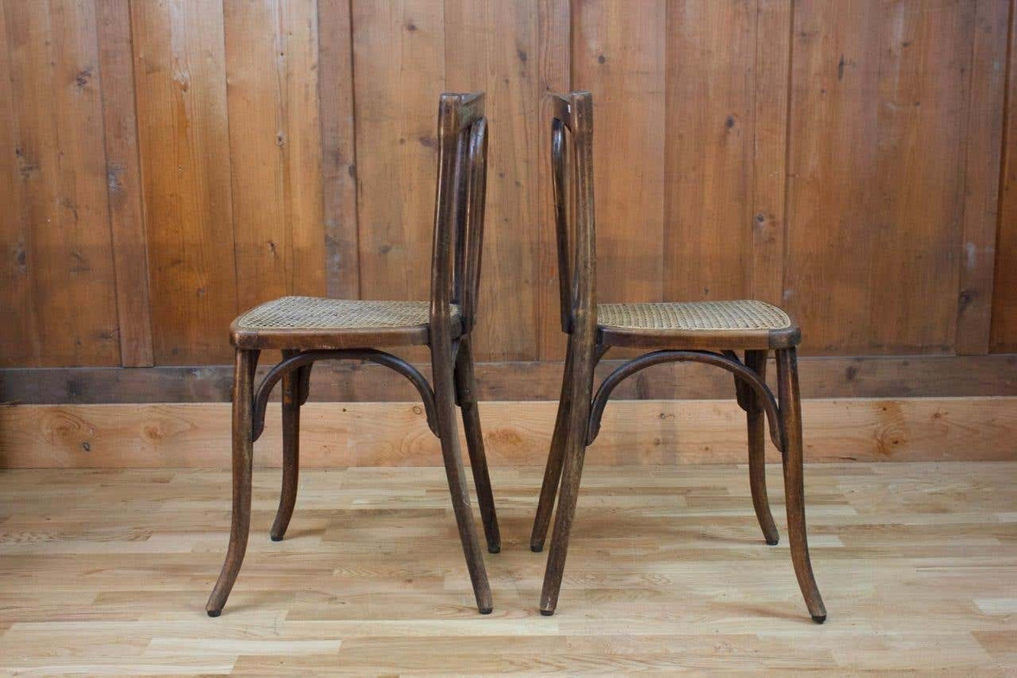 Pair of wooden bistro chairs, 20th century, France