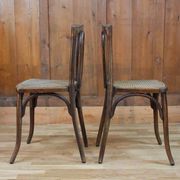 Pair of wooden bistro chairs, 20th century, France