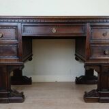Unusual Renaissance style center desk made in the mid-19th century in walnut