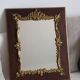 Old wooden and stucco mirror