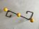 Wall-mounted coat rack in metal and wood with 3 hooks, antique item.
