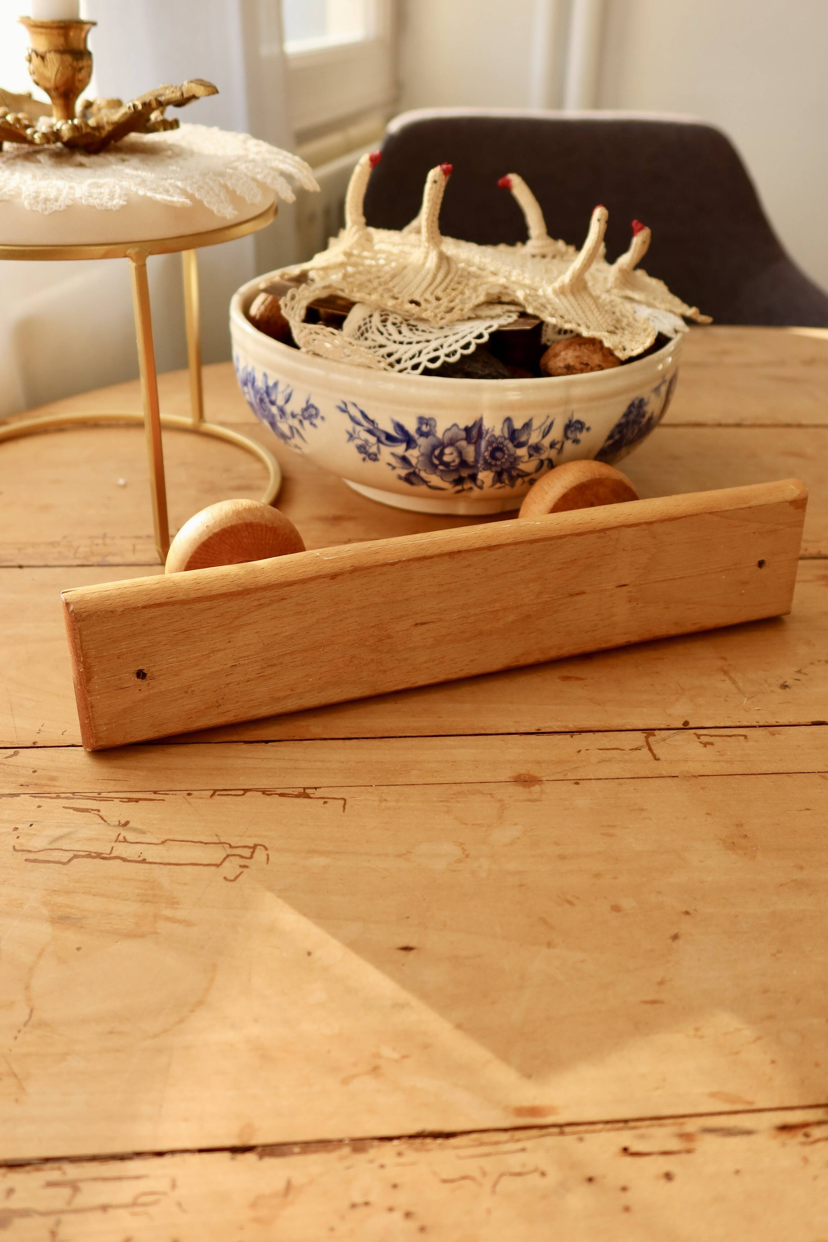 Vintage wall coat rack in pine with 2 hooks.