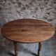French antique round dining table in walnut, circa 1880–1900.