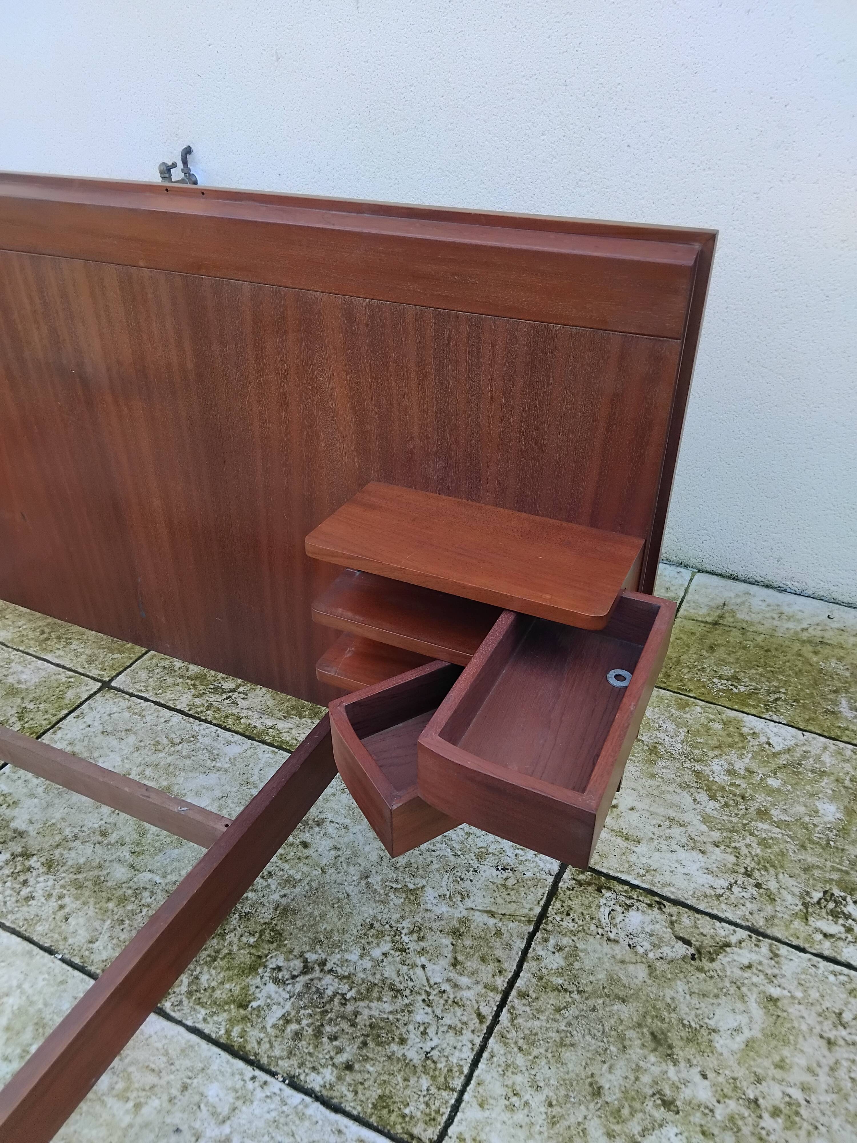 Vintage Scandinavian teak adult bed from the 60s and 70s bedside table.