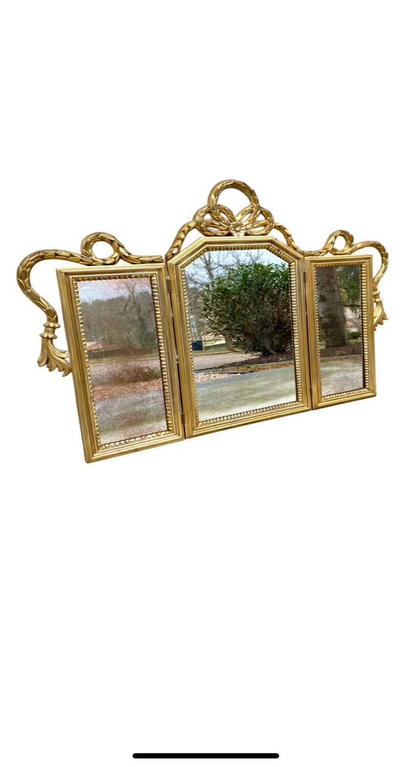 Miroir triptyque en bois doré et sculpté