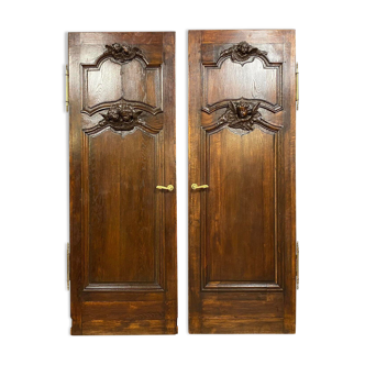 Pair of woodwork doors of Château aux Putti in oak period eighteenth century