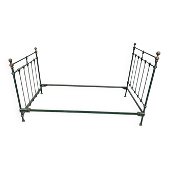 Green metal bed